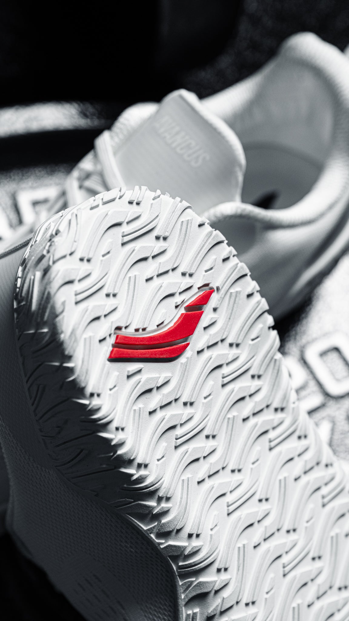 Sole of a white Avancus powerlifting shoe